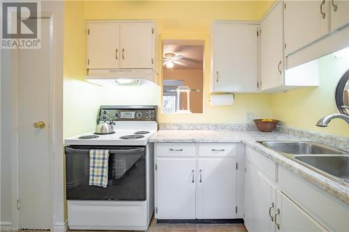 18 Barry Street Unit# 12, St. Catharines, ON - Indoor Photo Showing Kitchen With Double Sink