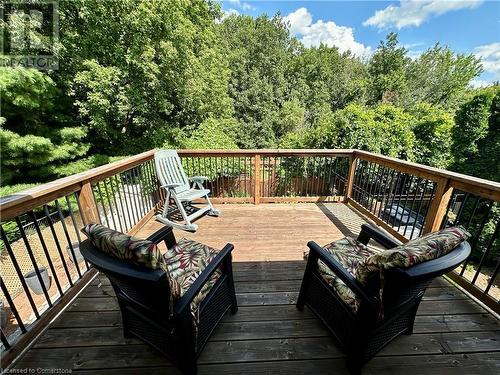 Master bedroom deck overlooking the tranquil backyard and peaceful Bruleville Nature park , a great way to relax and enjoy your morning coffee - 16 Flamingo Drive, Hamilton, ON - Outdoor With Balcony