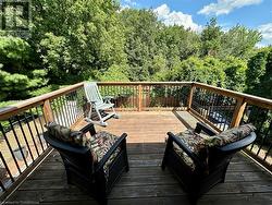 Master bedroom deck overlooking the tranquil backyard and peaceful Bruleville Nature park , a great way to relax and enjoy your morning coffee - 