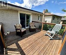 Master bedroom deck overlooking the tranquil backyard and peaceful Bruleville Nature park , a great way to relax and enjoy your morning coffee - 