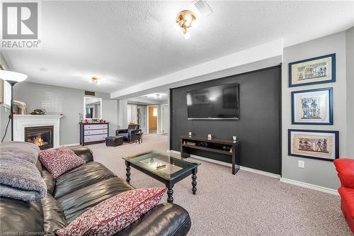 60 Anderson Avenue, Simcoe, ON - Indoor Photo Showing Living Room With Fireplace