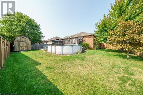 60 Anderson Avenue, Simcoe, ON - Outdoor With Above Ground Pool With Backyard