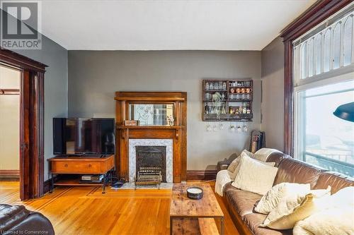 10 Huntley Street, Hamilton, ON - Indoor Photo Showing Living Room With Fireplace