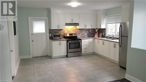 13 Hampstead Place, St. Catharines, ON - Indoor Photo Showing Kitchen With Double Sink