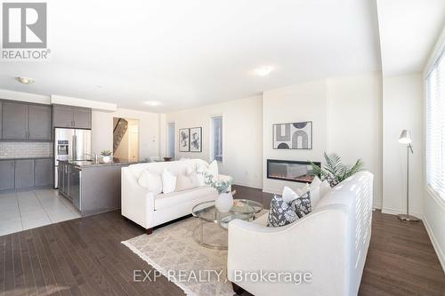 10 Donald Ficht Crescent, Brampton (Bram West), ON - Indoor Photo Showing Living Room With Fireplace