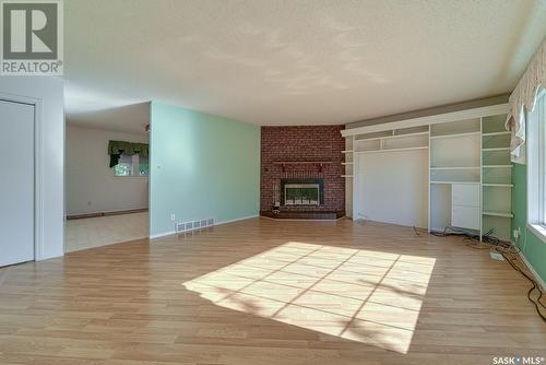 97 Edelweiss Crescent, Moose Jaw, SK - Indoor Photo Showing Other Room With Fireplace