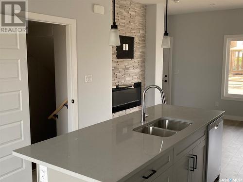 927 Brighton Gate, Saskatoon, SK - Indoor Photo Showing Kitchen With Double Sink