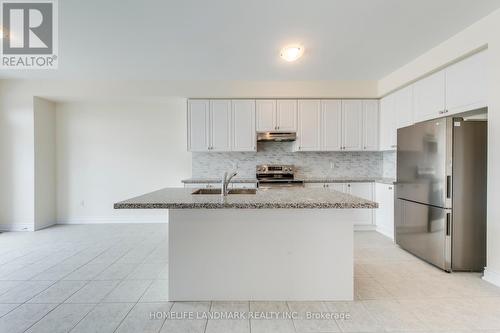 117 Kennedy Boulevard, New Tecumseth, ON - Indoor Photo Showing Kitchen With Stainless Steel Kitchen With Upgraded Kitchen