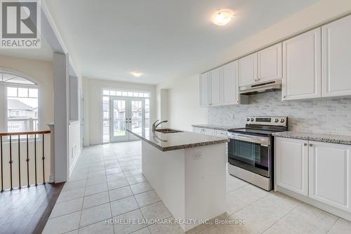 117 Kennedy Boulevard, New Tecumseth, ON - Indoor Photo Showing Kitchen With Upgraded Kitchen