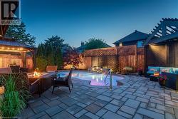 Enjoy evenings in a heated salt water pool with waterfall and accent lighting - 