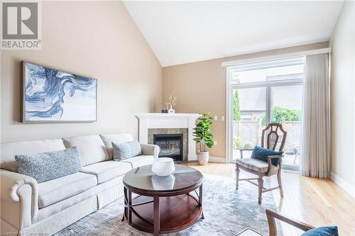 2165 Itabashi Way Unit# 14, Burlington, ON - Indoor Photo Showing Living Room With Fireplace