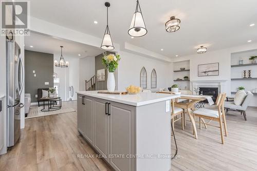 70 Harpin Way W, Centre Wellington (Fergus), ON - Indoor Photo Showing Kitchen With Upgraded Kitchen