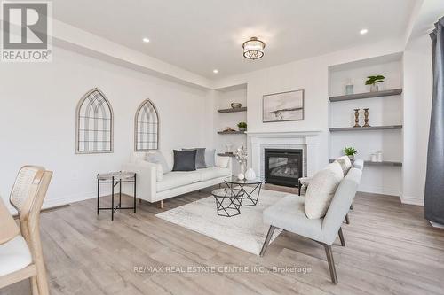 70 Harpin Way W, Centre Wellington (Fergus), ON - Indoor Photo Showing Living Room With Fireplace