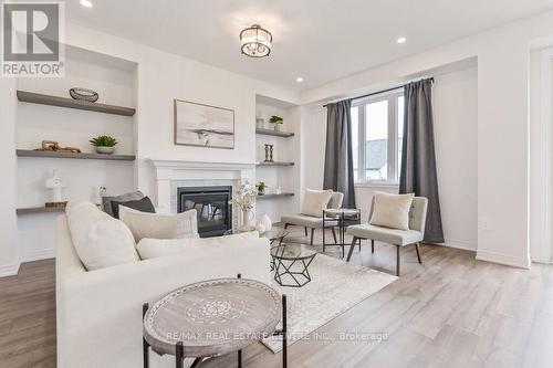 70 Harpin Way W, Centre Wellington (Fergus), ON - Indoor Photo Showing Living Room With Fireplace