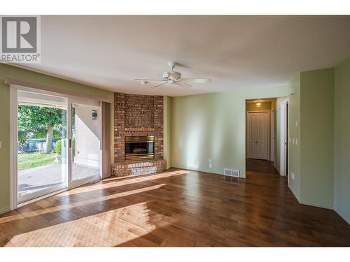 3333 South Main Street Unit# 129, Penticton, BC - Indoor Photo Showing Living Room With Fireplace