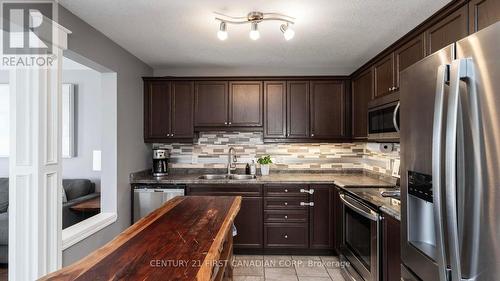 18 Leesboro Trail, Thames Centre (Thorndale), ON - Indoor Photo Showing Kitchen With Double Sink