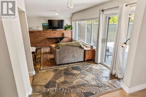 B - 11532 Longwoods Road, Middlesex Centre (Delaware Town), ON - Indoor Photo Showing Other Room With Fireplace