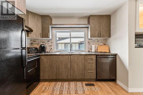 B - 11532 Longwoods Road, Middlesex Centre (Delaware Town), ON - Indoor Photo Showing Kitchen With Double Sink