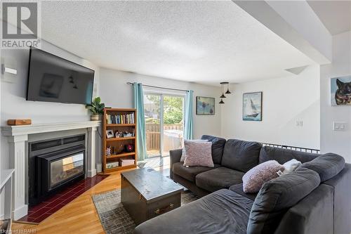 51 Caroga Court Unit# 3, Hamilton, ON - Indoor Photo Showing Living Room With Fireplace