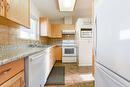 13-3096 South Main Street, Penticton, BC  - Indoor Photo Showing Kitchen With Double Sink 