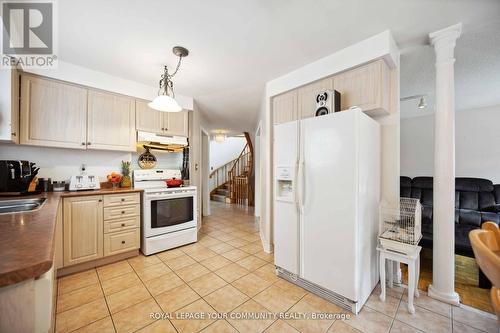 67 Waterbury Street, Caledon, ON - Indoor Photo Showing Kitchen With Double Sink