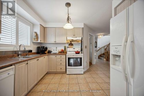 67 Waterbury Street, Caledon, ON - Indoor Photo Showing Kitchen With Double Sink