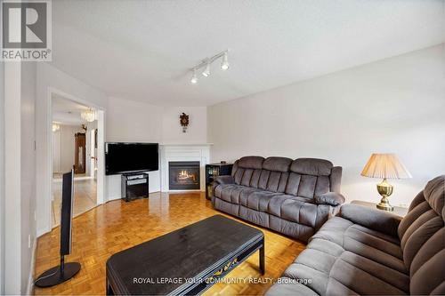 67 Waterbury Street, Caledon, ON - Indoor Photo Showing Living Room With Fireplace