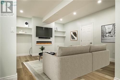 virtually staged Media room - 175 Oakhill Place, Hamilton, ON - Indoor