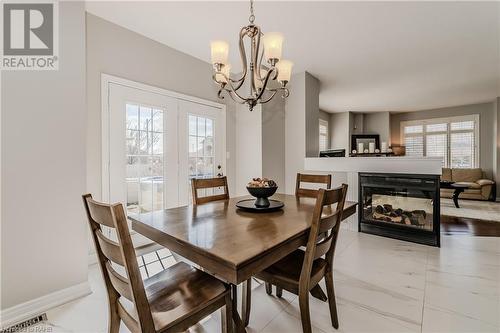 60 Springbreeze Heights, Hamilton, ON - Indoor Photo Showing Dining Room With Fireplace