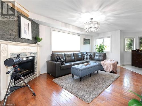 592 Rendezvous Court, Windsor, ON - Indoor Photo Showing Living Room With Fireplace