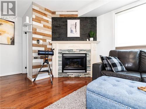 592 Rendezvous Court, Windsor, ON - Indoor Photo Showing Living Room With Fireplace