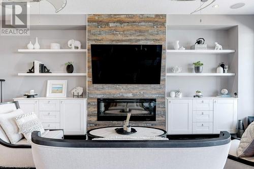 8 Pierre Trudeau Lane, Grimsby, ON - Indoor Photo Showing Living Room With Fireplace