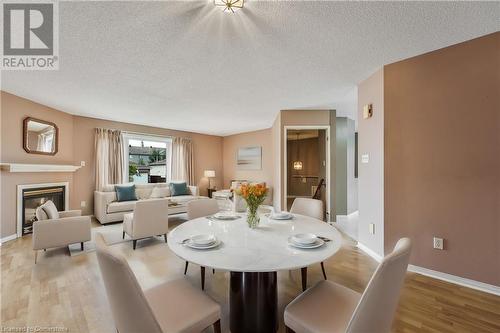 2 Mapleton Avenue, Barrie, ON - Indoor Photo Showing Dining Room With Fireplace