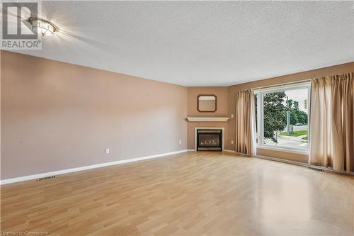 2 Mapleton Avenue, Barrie, ON - Indoor Photo Showing Living Room With Fireplace