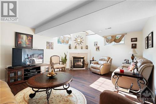 78 Hummingbird Crescent, Ottawa, ON - Indoor Photo Showing Living Room With Fireplace