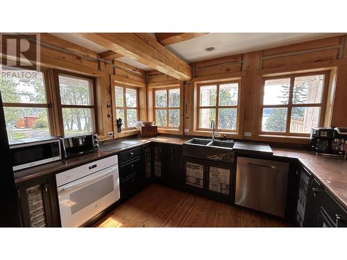 4802 Hamilton Road, Lac La Hache, BC - Indoor Photo Showing Kitchen With Double Sink