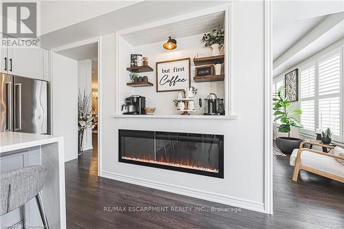 27 Menzies Street, Hamilton, ON - Indoor Photo Showing Living Room With Fireplace