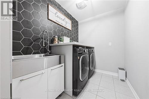 27 Menzies Street, Hamilton (Binbrook), ON - Indoor Photo Showing Laundry Room