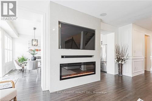 27 Menzies Street, Hamilton, ON - Indoor Photo Showing Living Room With Fireplace