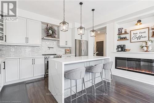 27 Menzies Street, Hamilton (Binbrook), ON - Indoor Photo Showing Kitchen With Upgraded Kitchen