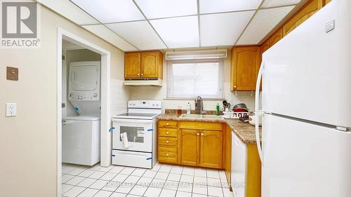 Upper 2 - 57 Painswick Crescent, Toronto, ON - Indoor Photo Showing Laundry Room