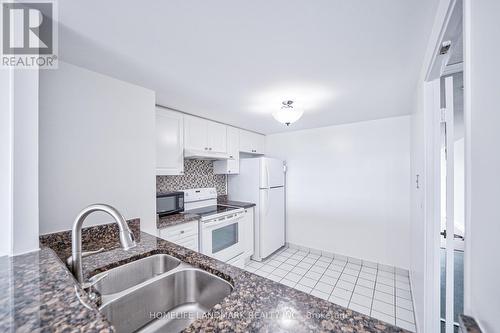 1009 - 18 Lee Centre Drive, Toronto, ON - Indoor Photo Showing Kitchen With Double Sink