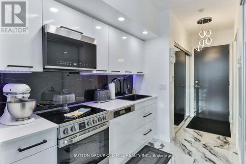 506 - 105 The Queensway, Toronto (High Park-Swansea), ON - Indoor Photo Showing Kitchen