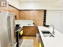 1925 Enterprise Way Unit# 305, Kelowna, BC  - Indoor Photo Showing Kitchen With Double Sink 