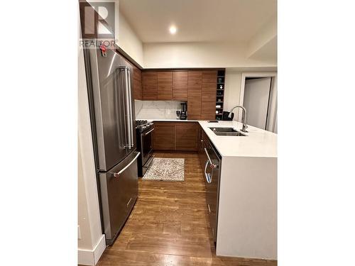 1925 Enterprise Way Unit# 305, Kelowna, BC - Indoor Photo Showing Kitchen With Double Sink