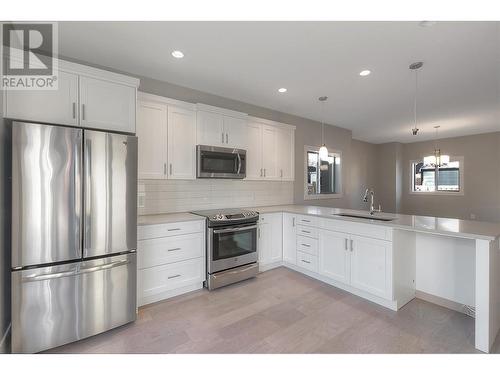 1480 Inkar Road, Kelowna, BC - Indoor Photo Showing Kitchen With Stainless Steel Kitchen With Upgraded Kitchen