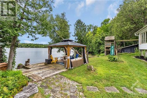 101 Arthur Road, Tay Valley, ON - Outdoor With Body Of Water With Backyard