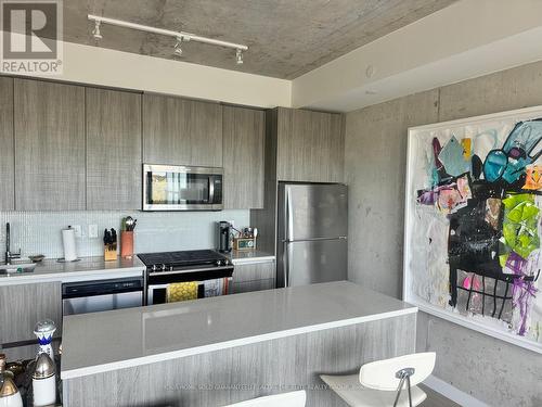 712 - 246 Logan Avenue, Toronto, ON - Indoor Photo Showing Kitchen