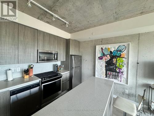 712 - 246 Logan Avenue, Toronto (South Riverdale), ON - Indoor Photo Showing Kitchen