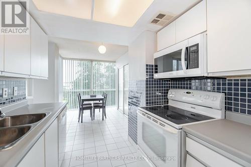 408 - 350 Webb Drive, Mississauga (City Centre), ON - Indoor Photo Showing Kitchen With Double Sink